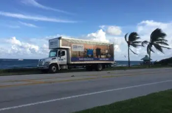 Miracle Movers moving truck on the road