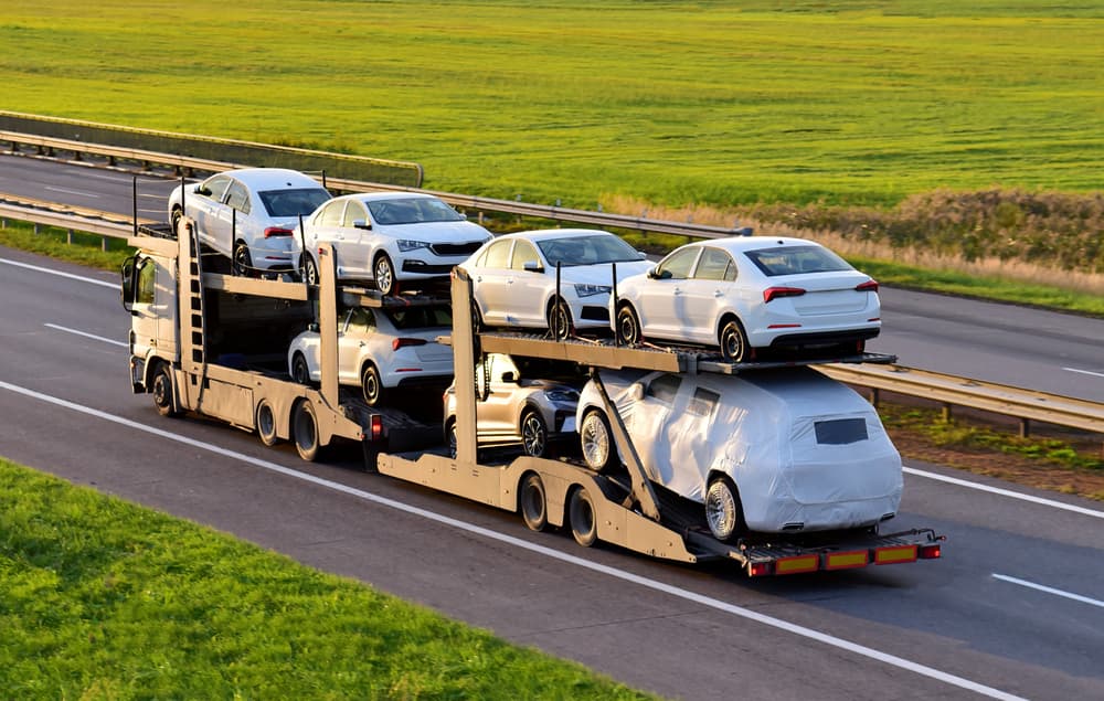 What should I look for when hiring a car shipping company