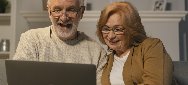 An elderly couple researching the best places in GTA for seniors