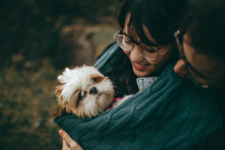 a happy owners and a dog after exploring dog friendly activities in Mississauga